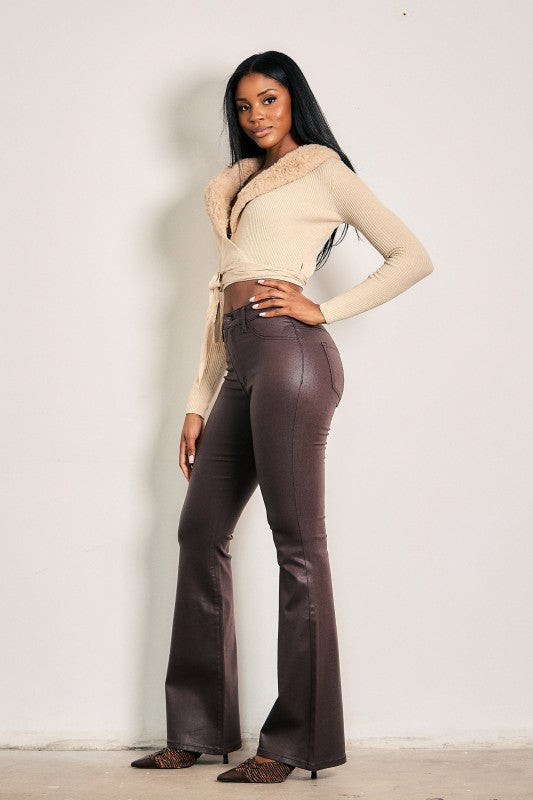 Brown Sugar Coated Boot Cut Jeans angled full-length view showing the fitted hip and long flared leg