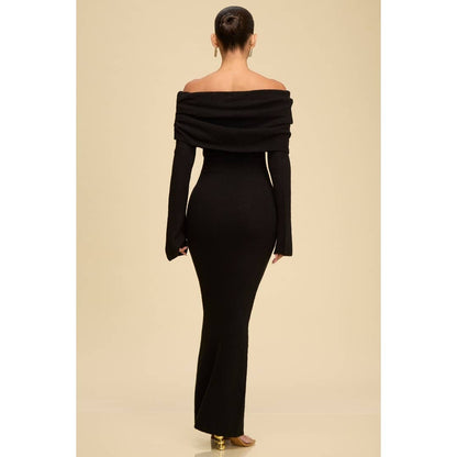 Back view of the Noir Off-Shoulder Knit Sweater Dress in black