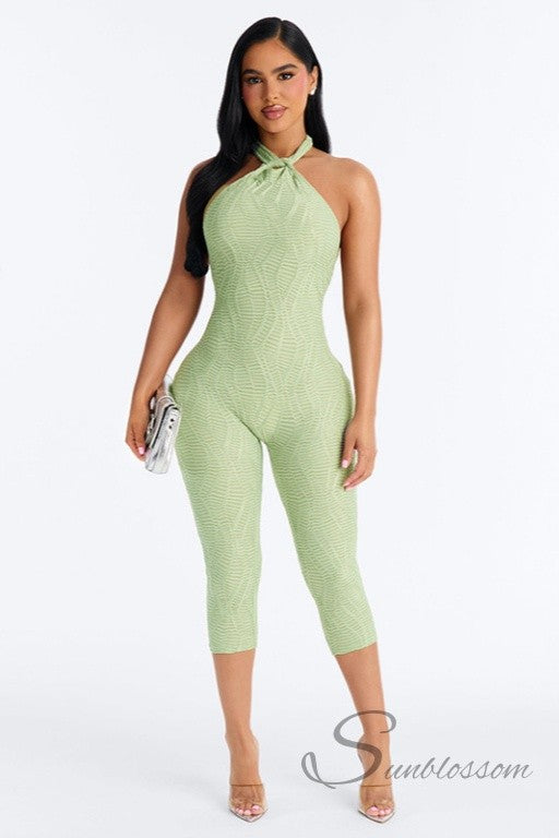 Green palm print halter capri jumpsuit with stretchy bodycon fit