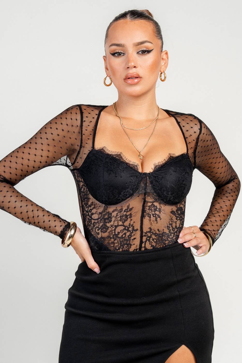 Black Swiss Dot Lace Bodysuit with sheer mesh, sweetheart neckline, and long sleeves