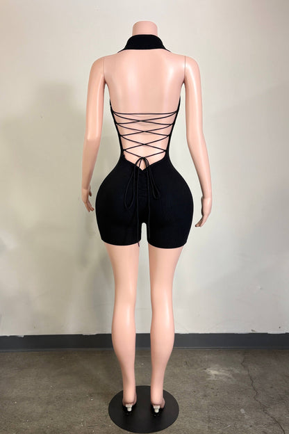 Back view of Worth the Wait Romper with lace-up open back
